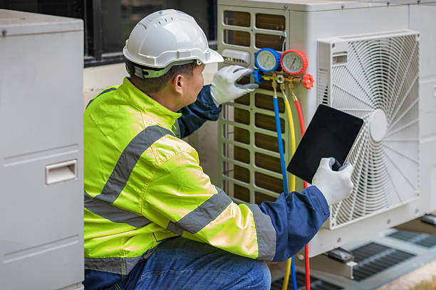 Professional Air Conditioning Repair technician working in Onward, IN